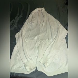 Very pale pink lululemon hooded cardigan sweater.